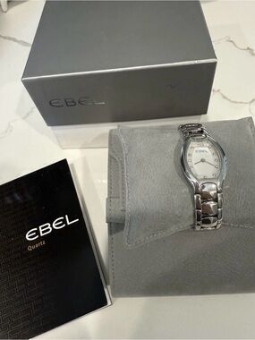 Ebel Women's Stainless Steel Bracelet Watch - Silver cones with Box and papers.